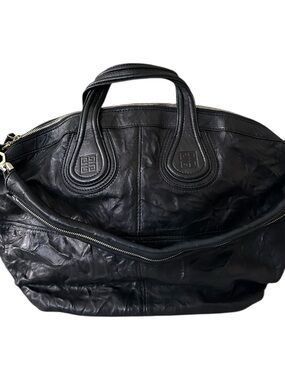 Givenchy Sheepskin Large
Nightingale Black Handbag with Gold toned hardware.